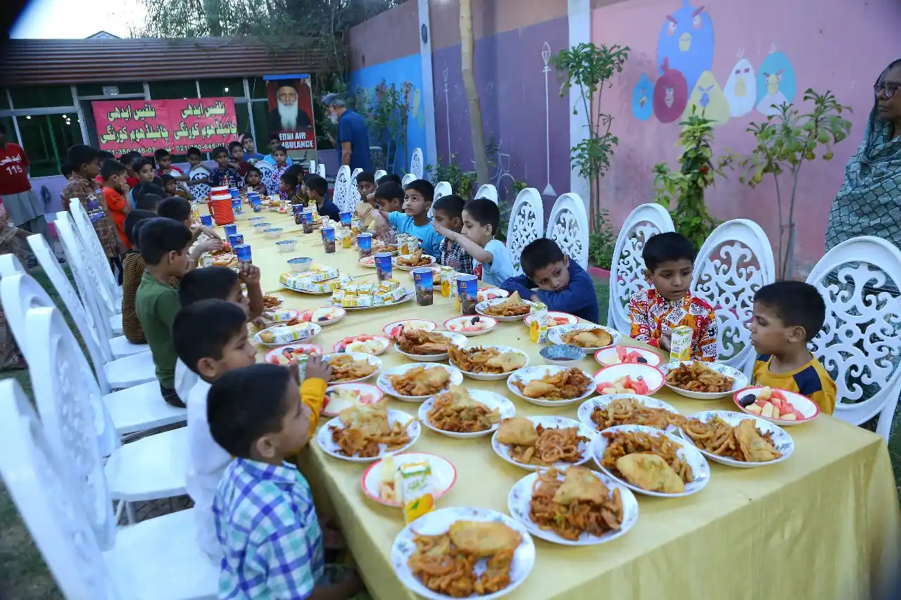 Edhi Foundation UK Zakat distribution - families receiving food aid during Ramadan